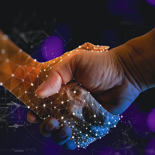 Shaking hands in the metaverse.  iStock purchase 1367696846
